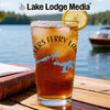 Glass of iced tea with a lemon slice, featuring a compass and map design.