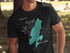 Black t-shirt with "Lake Tiorati New York" text and teal compass rose map.