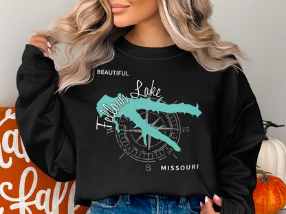 Black sweatshirt with turquoise Fellows Lake map and compass graphic.