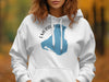 White hoodie with Emerald Lake Canada map graphic and compass rose.