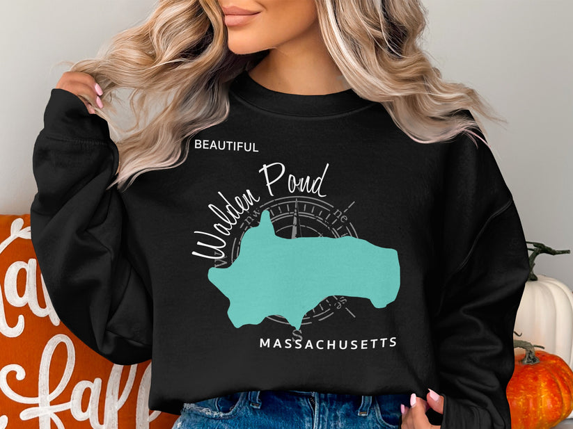 Black sweatshirt with a turquoise map of Walden Pond, Massachusetts.
