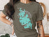 Lake Chaubunagungamaug Massachusetts map graphic on olive green t-shirt.