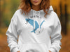 White hoodie with Lake Siskiyou California graphic and compass rose, on a person.
