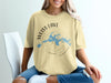 Weiss Lake Alabama map and compass graphic on a tan t-shirt.