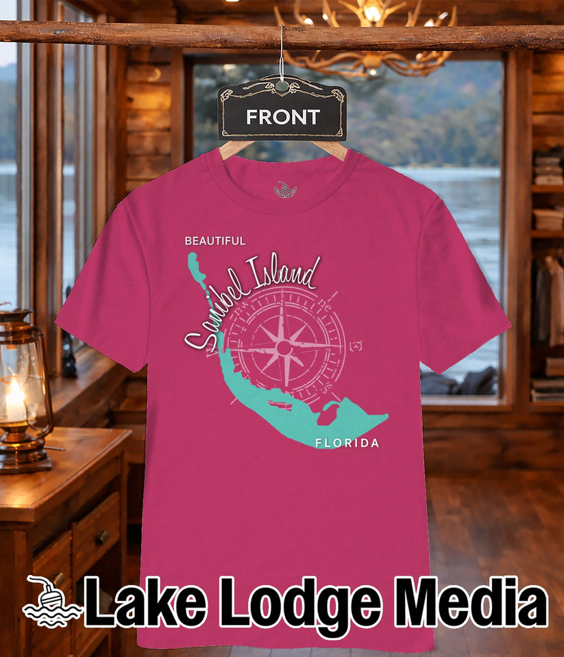 Pink t-shirt with a compass rose and Sanibel Island map, "Lake Lodge Media" text.