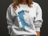White sweatshirt with Lake Quivira Kansas map and compass design.