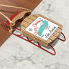 Wooden Christmas ornament in the shape of a sled with "Merry Christmas from Lake America" text.
