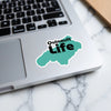 Teal sticker on laptop with "Quinault Life" text