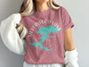 Pink t-shirt with text "Silverwood Lake California" and a teal map outline.