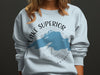 Light blue sweatshirt with Lake Superior map and compass graphic.