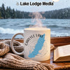 White mug with "Carlyle Lake Illinois" map and compass design on a rainy day.