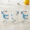 Three clear glasses featuring blue Hebgen Lake maps and compass rose designs.