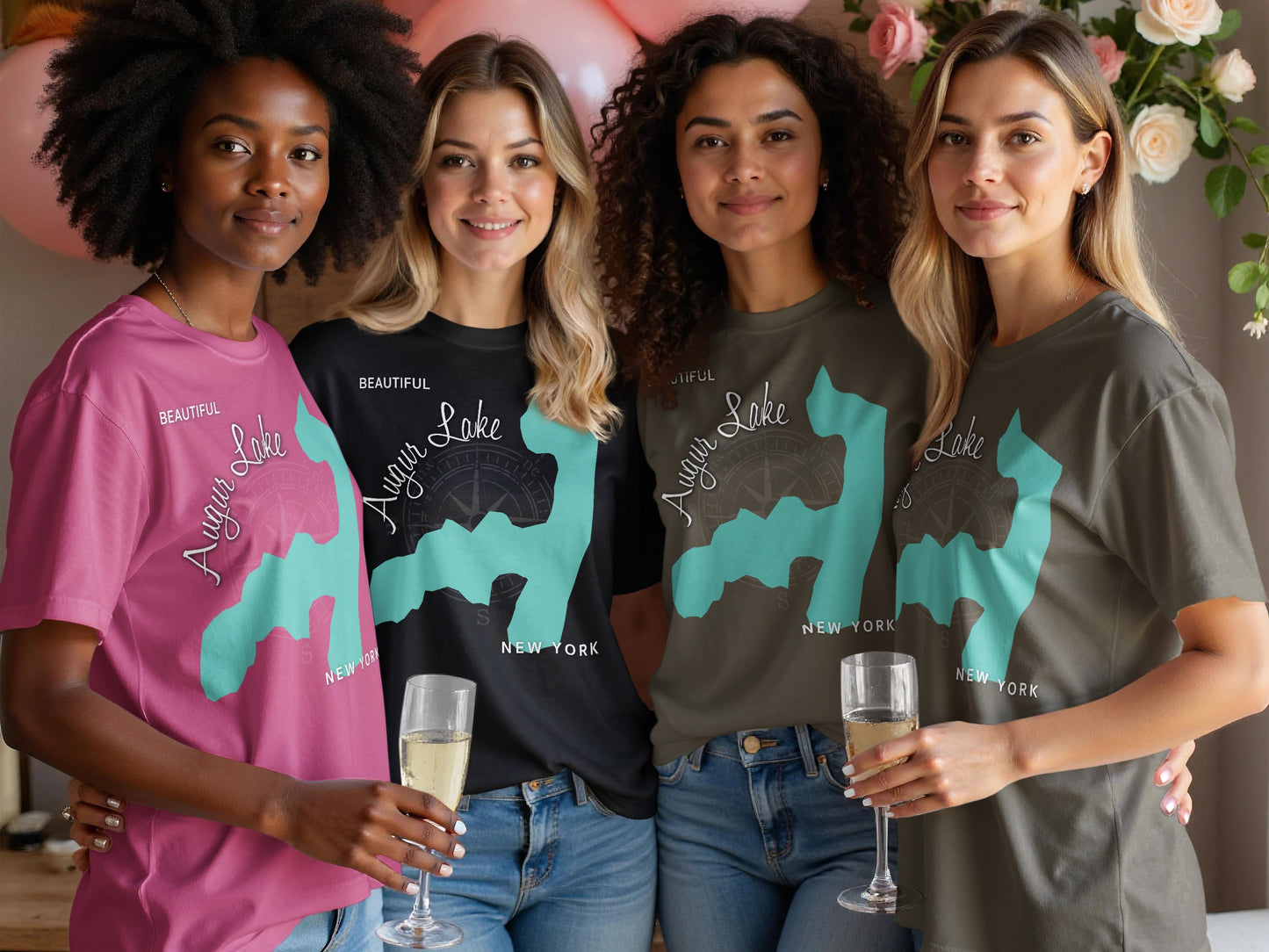 Four women in t-shirts with "Augur Lake New York" text and map graphic.