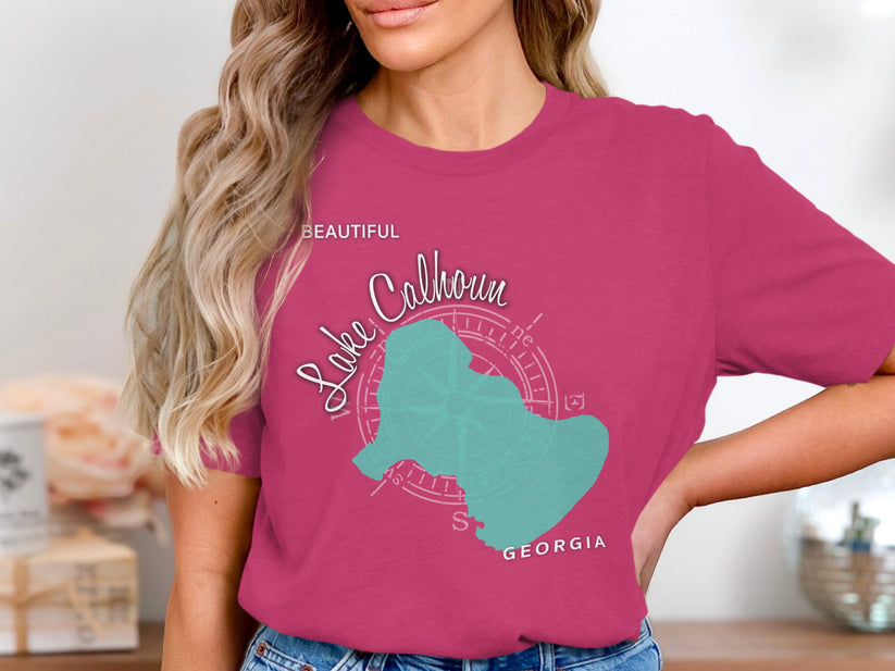 Pink t-shirt with teal Lake Calhoun map and compass graphic.