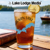 Glass of iced tea with "Shokan Lake" graphic, lake and boat background.