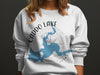 White sweatshirt with Caddo Lake Texas map and compass design.