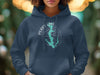 Navy blue hoodie with a teal Perry Lake Kansas map and compass design.