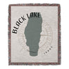 Woven blanket featuring a map of Black Lake, Idaho, with compass rose.