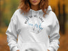 White hoodie with Bull Shoals Lake compass design and Arkansas text.