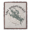 Lake Winnipesaukee map on a fringed throw blanket with compass rose and text.