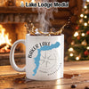 White mug with Baker Lake map, compass, and Washington text.