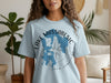 Light blue t-shirt with "Lake Massabesic New Hampshire" text and map graphic.