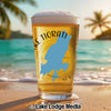 Glass of beer with "Lake Tiorati New York" map design on beach background.