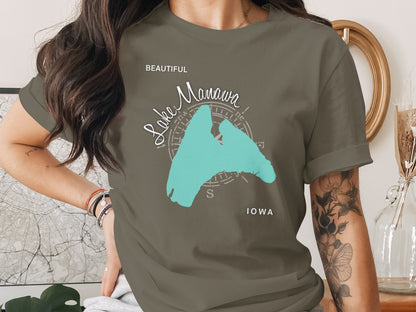 T-shirt with Manawa lake outline and compass rose, "Beautiful Manawa Iowa" text.