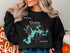 Black sweatshirt with "Lake Monroe" map and compass design, Indiana.