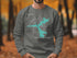Gray sweatshirt with Nautana Lake North Carolina map and compass design.