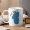 White mug with blue Lake Tahoe map outline, compass, and text.