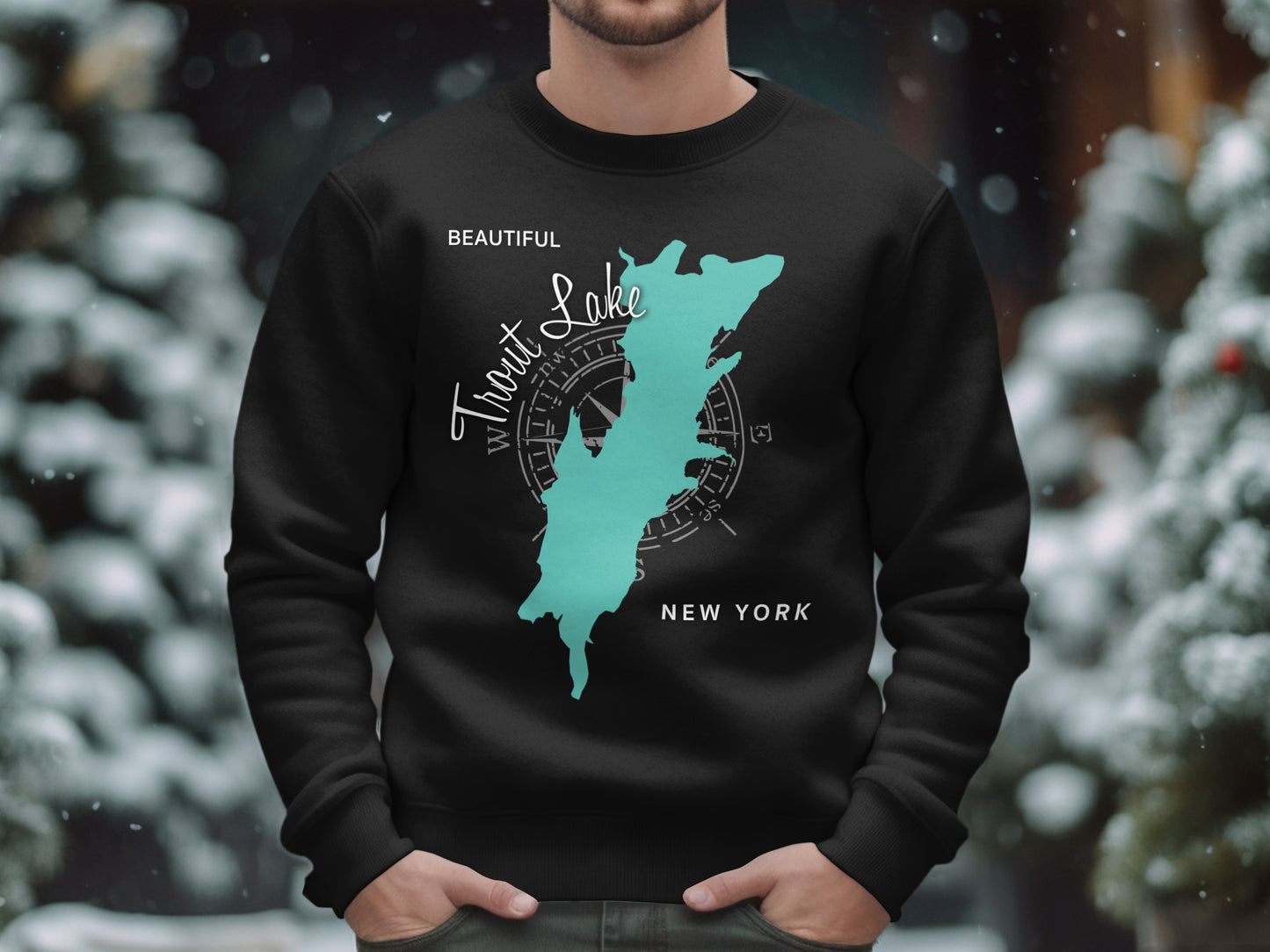 Black sweatshirt with a teal map outline of Trout Lake and compass graphic.
