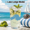 Glass with Lake Superior design, limes, mint, and beach background.