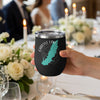 Black tumbler with turquoise Carlyle Lake outline and compass rose design