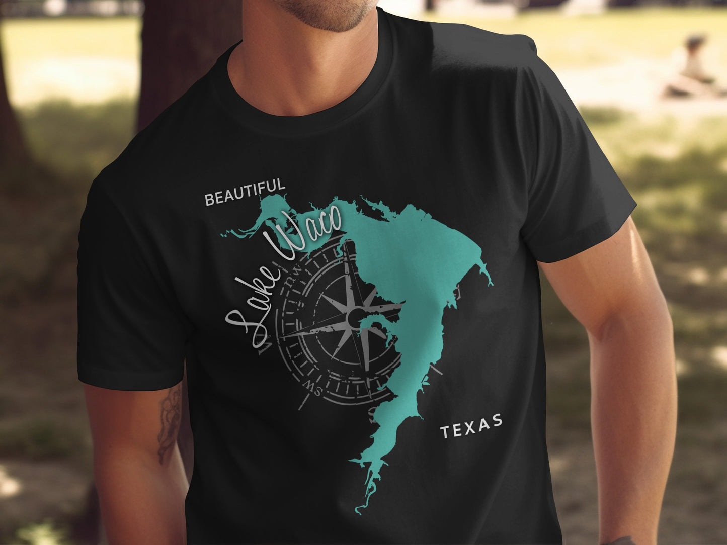 Black t-shirt with Lake Waco map and compass graphic, "Beautiful Lake Waco Texas."