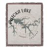 Woven blanket with Patoka Lake map design and compass.