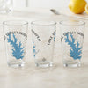 Three clear glasses with blue Lake Stanley Draper map and compass design.