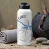 White insulated water bottle with "LAKE" and a blue compass rose with lake silhouette design.