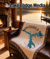 Throw blanket with Nantahala Lake map design and compass rose.