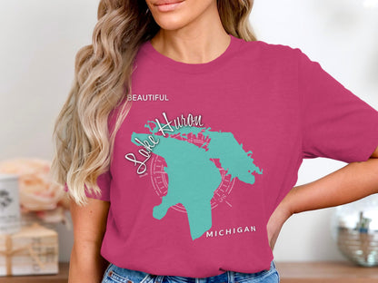 Pink t-shirt featuring a teal map outline of Lake Huron and the word "Beautiful".