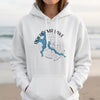 White hoodie with Pokegama Lake Minnesota graphic and compass rose.