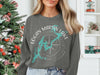 Charcoal sweatshirt with Logan Martin Lake Alabama design and compass graphic.
