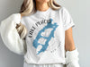 White t-shirt with blue Lake Placid, New York map and compass design.