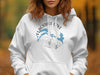 White hoodie with a blue Flagstaff Lake Maine compass and map design.