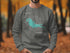 Gray sweatshirt with Lake Kabetogama Minnesota map and compass design.