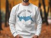 White sweatshirt with blue Rangeley Lake map graphic and compass detail.