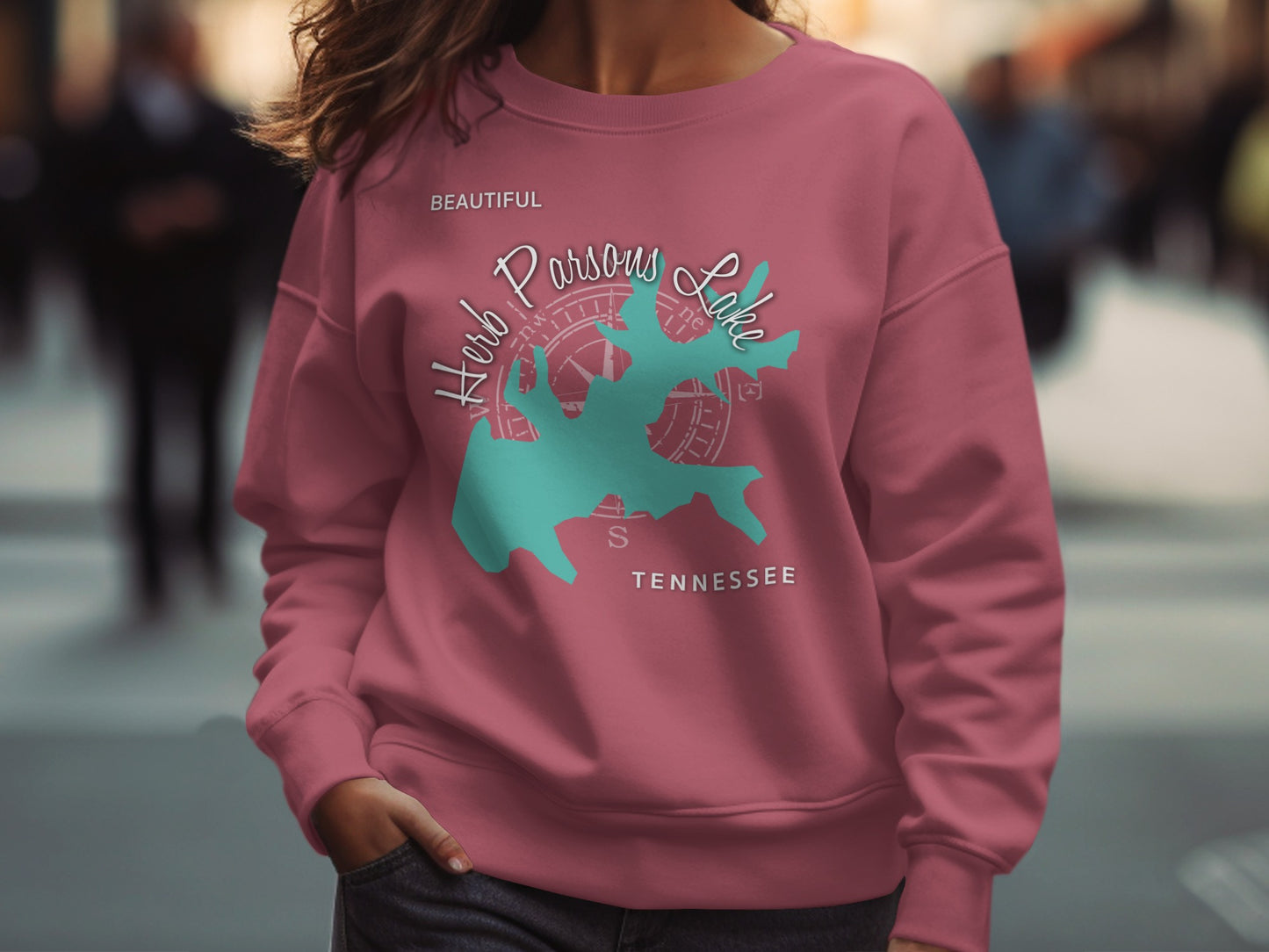 Pink sweatshirt with "Herb Parsons Lake Tennessee" map graphic.