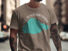 Taupe t-shirt with LAKE PONTCHARTRAIN graphic and compass rose.