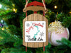 Sled ornament with "Merry Christmas FROM Bartlett Lake" text and lake outline.