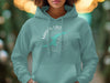 Teal hoodie with "Mason Lake Washington" text and a compass graphic.
